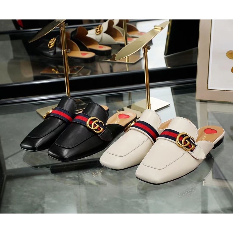 G*u*i slippers